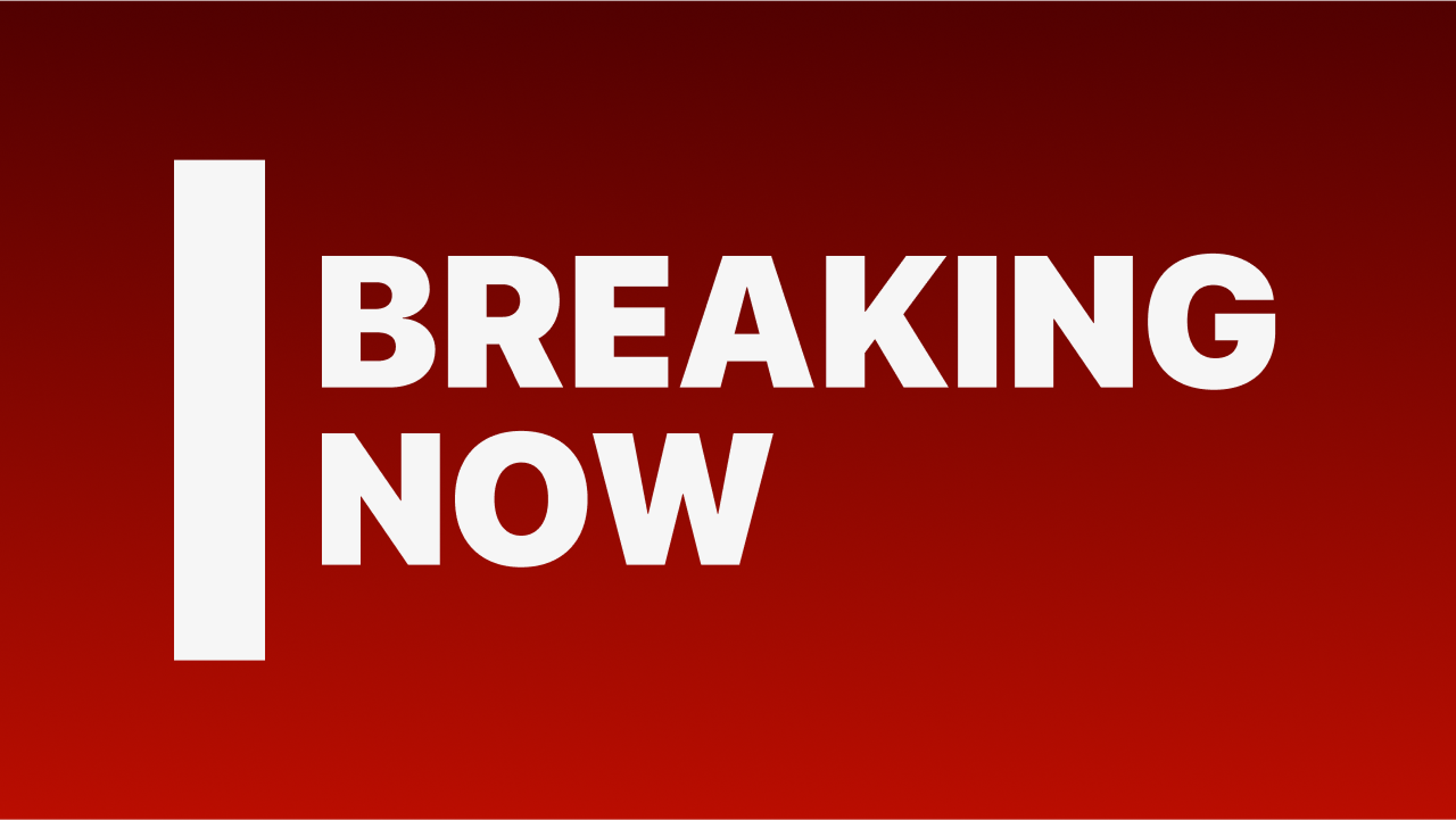 White letters read Breaking Now on a red background.