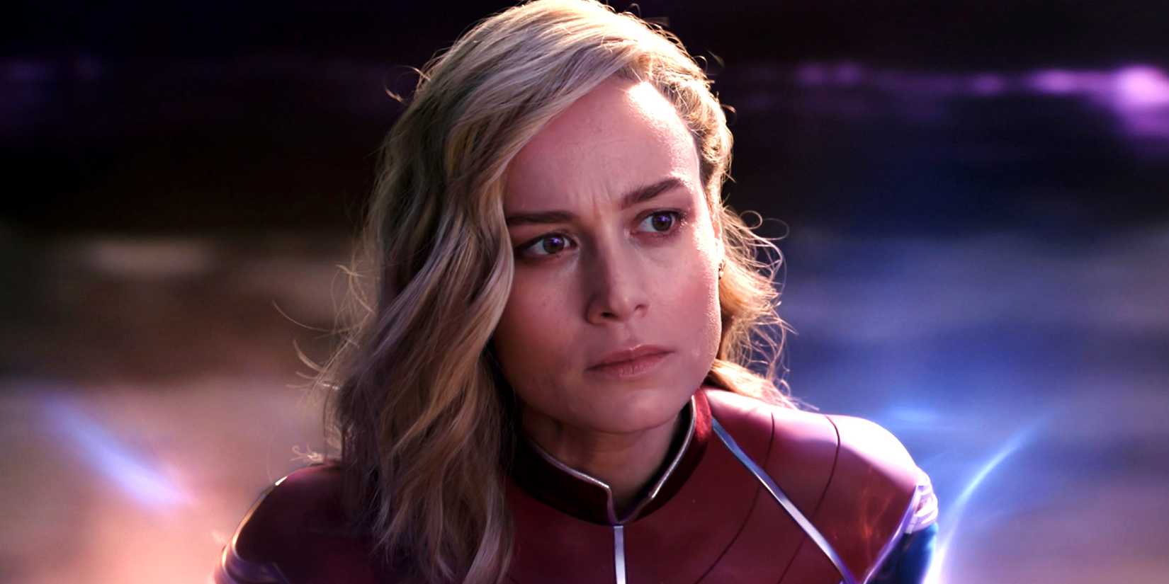 Captain Marvel glowing and looking serious in The Marvels