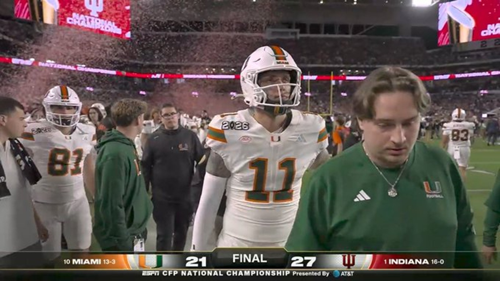 Carson Beck walking off the field