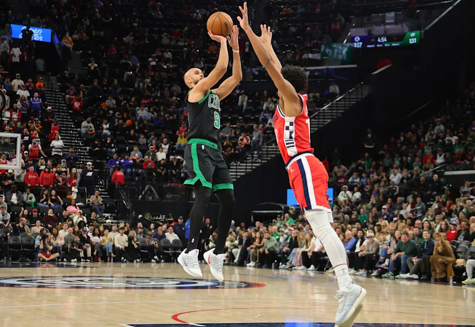 INGLEWOOD, CA - JANUARY 3: Derrick White #9 of the Boston Celtics shoots over Cam Christie #12 of the Los Angeles Clippers during the second half of an NBA game on January 3, 2026 at Intuit Dome in Inglewood, California. NOTE TO USER: User expressly acknowledges and agrees that, by downloading and or using this photograph, User is consenting to the terms and conditions of the Getty Images License Agreement. (Photo by Kevin Terrell/Getty Images)