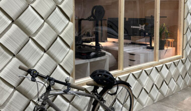 3D printed facade wraps workspace in japan like knit textile