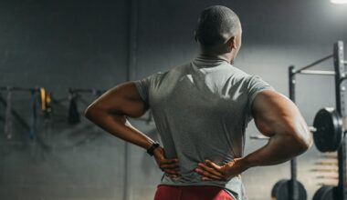 Expert Trainer Shares 5 Essential Moves to Beat Back Pain in 2026
