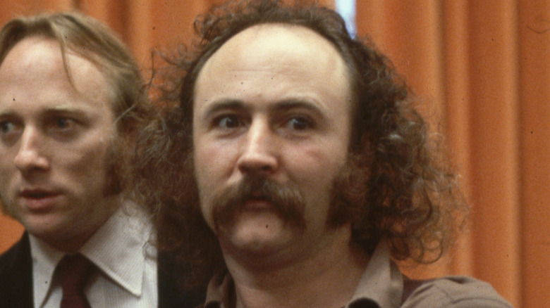 David Crosby looking wide-eyed in 1970s press phot