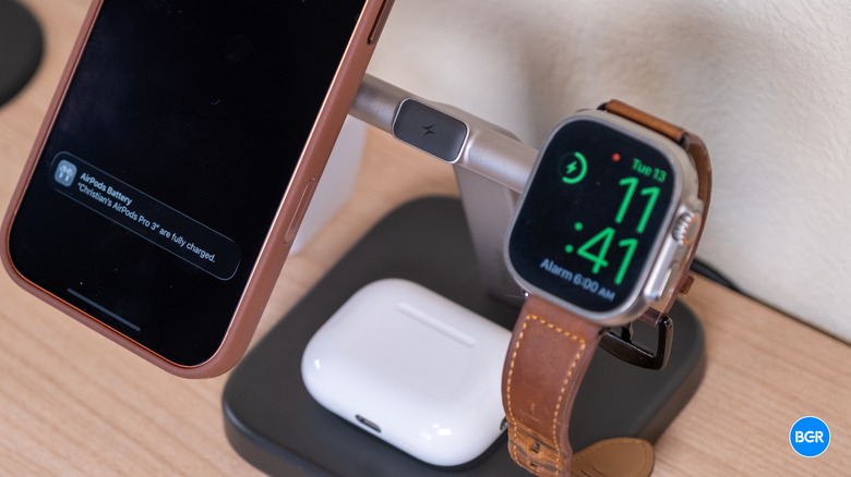 Three devices on the Mophie Qi2 3-in-1 Wireless Charging Stand