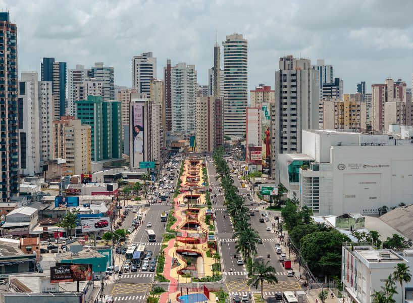 elevated linear park reclaims canal runing along brazilian city center