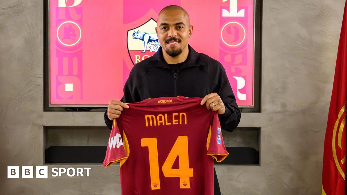 Donyell Malen poses with Roma shirt after joining from Aston Villa