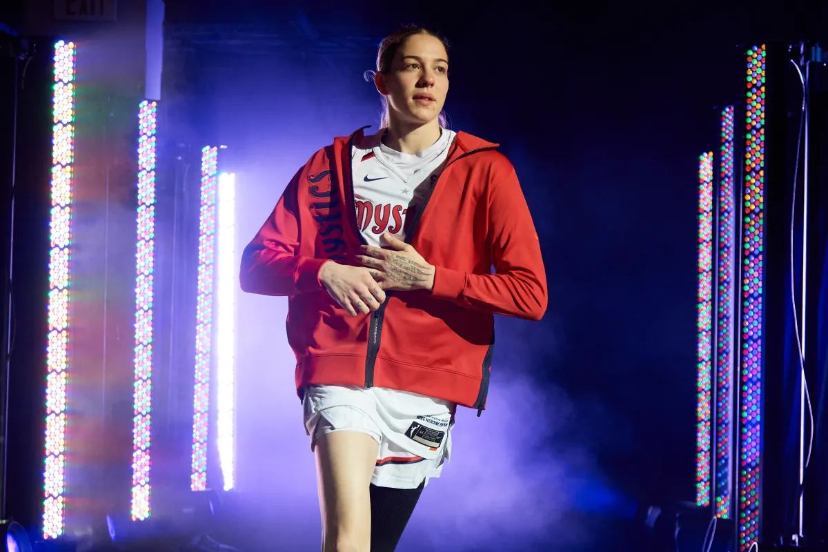 WASHINGTON, DC - MAY 16: Emily Engstler #21 of the Washington Mystics runs onto the court during player introductions before the game against the Atlanta Dream at Carefirst Arena on May 16, 2025 in Washington, DC. The Mystics defeated the Drea 94-90. NOTE TO USER: User expressly acknowledges and agrees that, by downloading and or using this Photograph, user is consenting to the terms and conditions of the Getty Images License Agreement (Photo by Hannah Foslien/Getty Images)