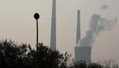 a cooling tower and chimneys are seen at a thermal power plant in beijing china november 3 2018 reuters