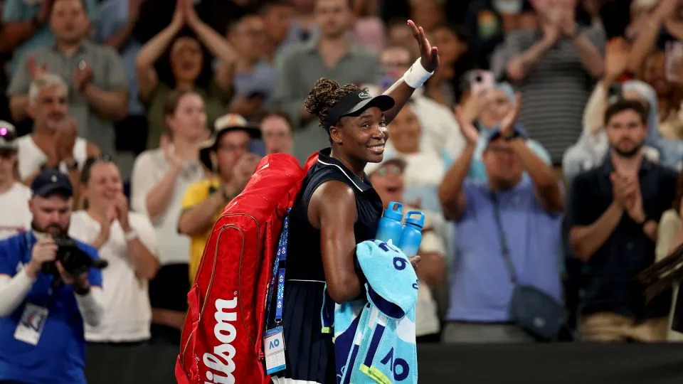 Venus Williams acknowledges the applause as she walks off the court after losing to Olga Danilovic. - Martin Keep/AFP/Getty Images