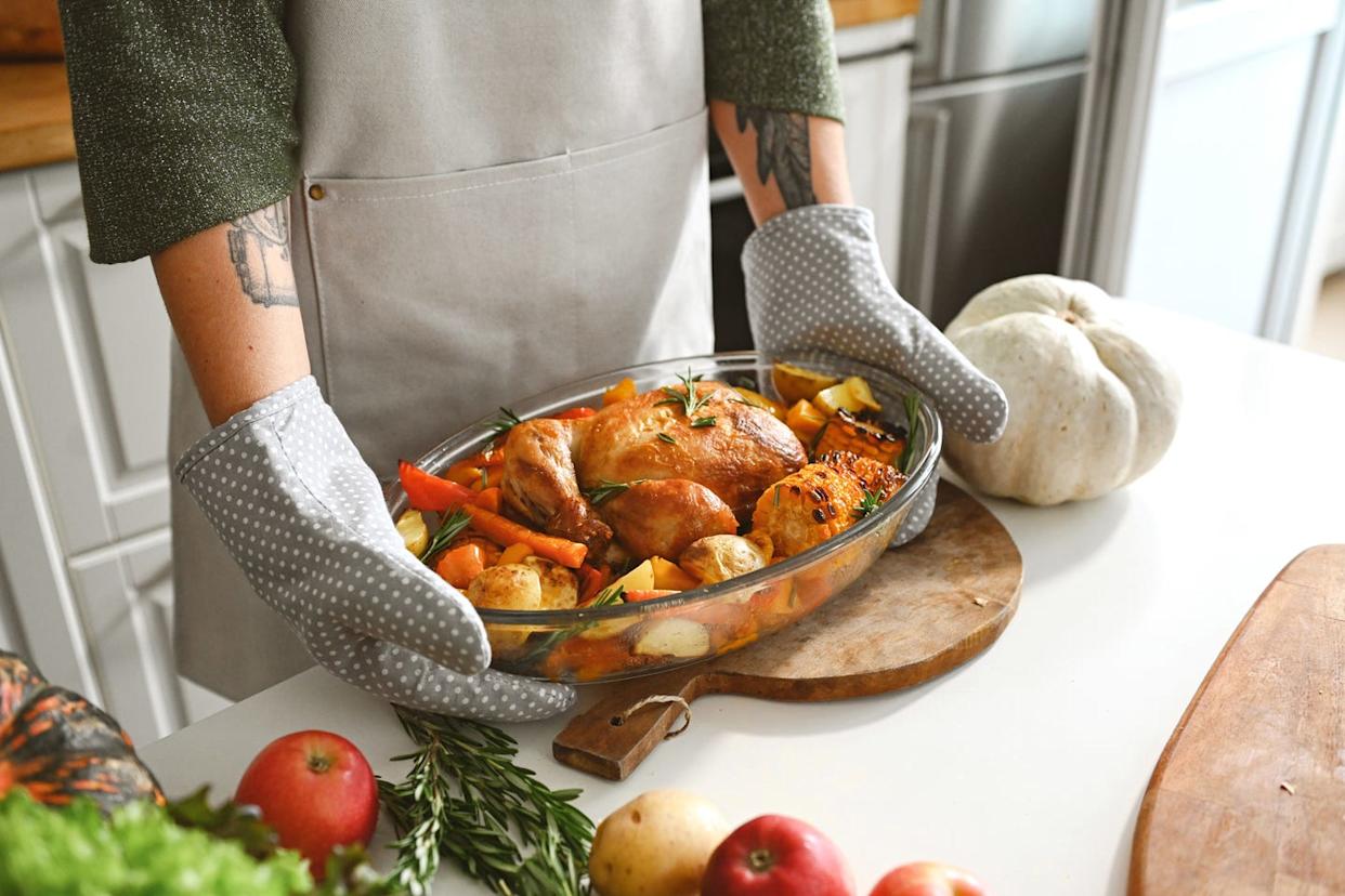 woman prepares a festive dinner