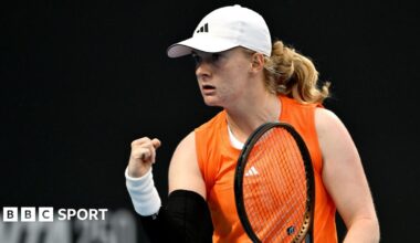 Luke Littler celebrates winning the 2026 PDC World Championship as tickertape falls