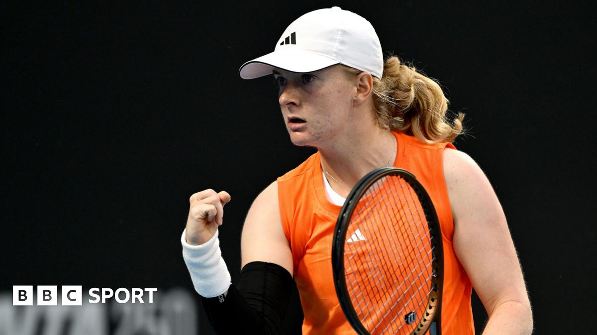 Luke Littler celebrates winning the 2026 PDC World Championship as tickertape falls