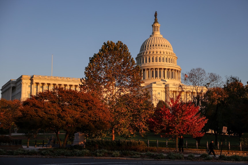 A white building with a domed roof