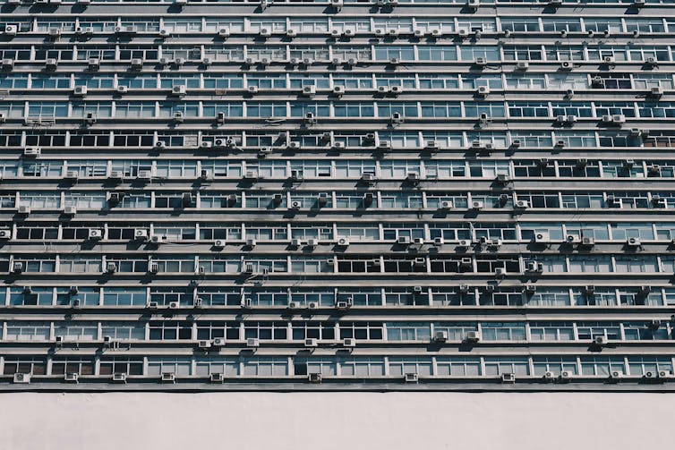 An office building covered in air conditioners in Brazil.