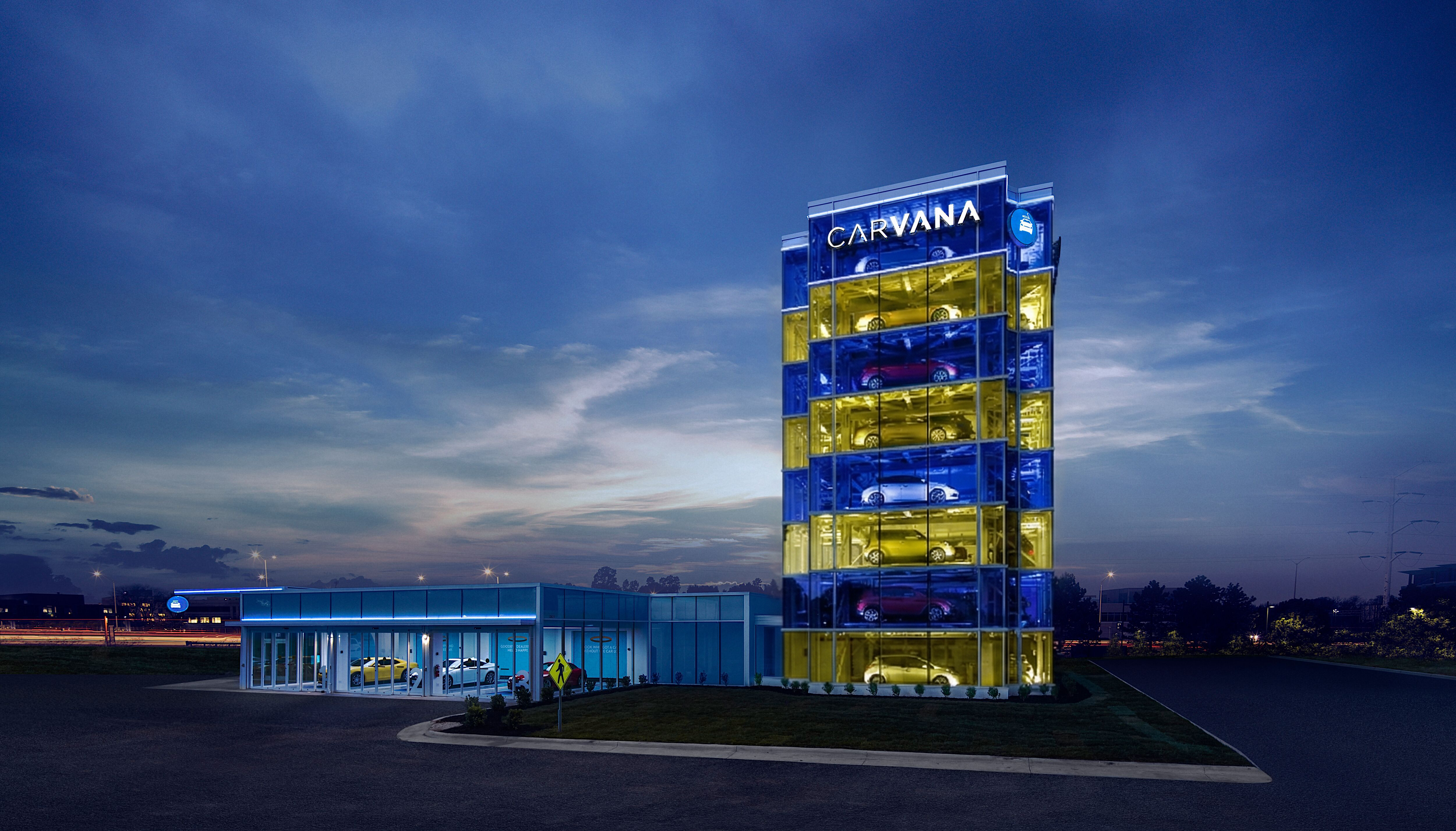Tall building with Carvana logo on top