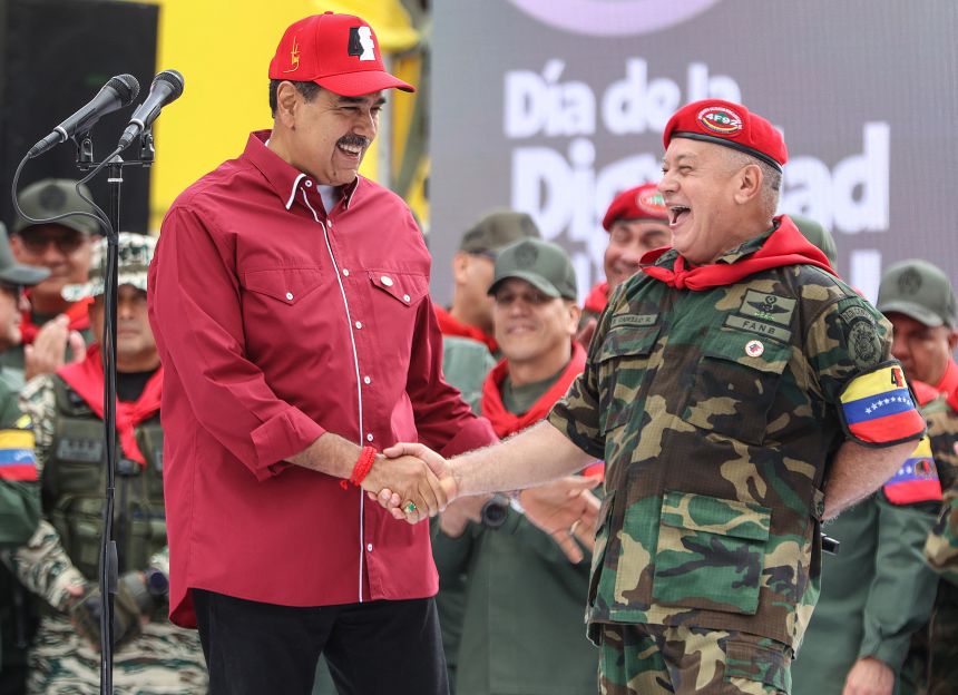 Venezuelan President Nicolas Maduro (L) greets his Interior Minister Diosdado Cabello during a rally on February 4, 2025.