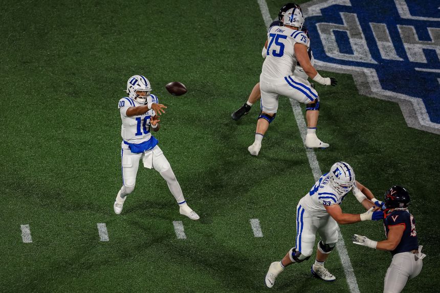 Darian Mensah passes the ball during the 2025 ACC Football Championship against the Virginia Cavaliers on December 6.