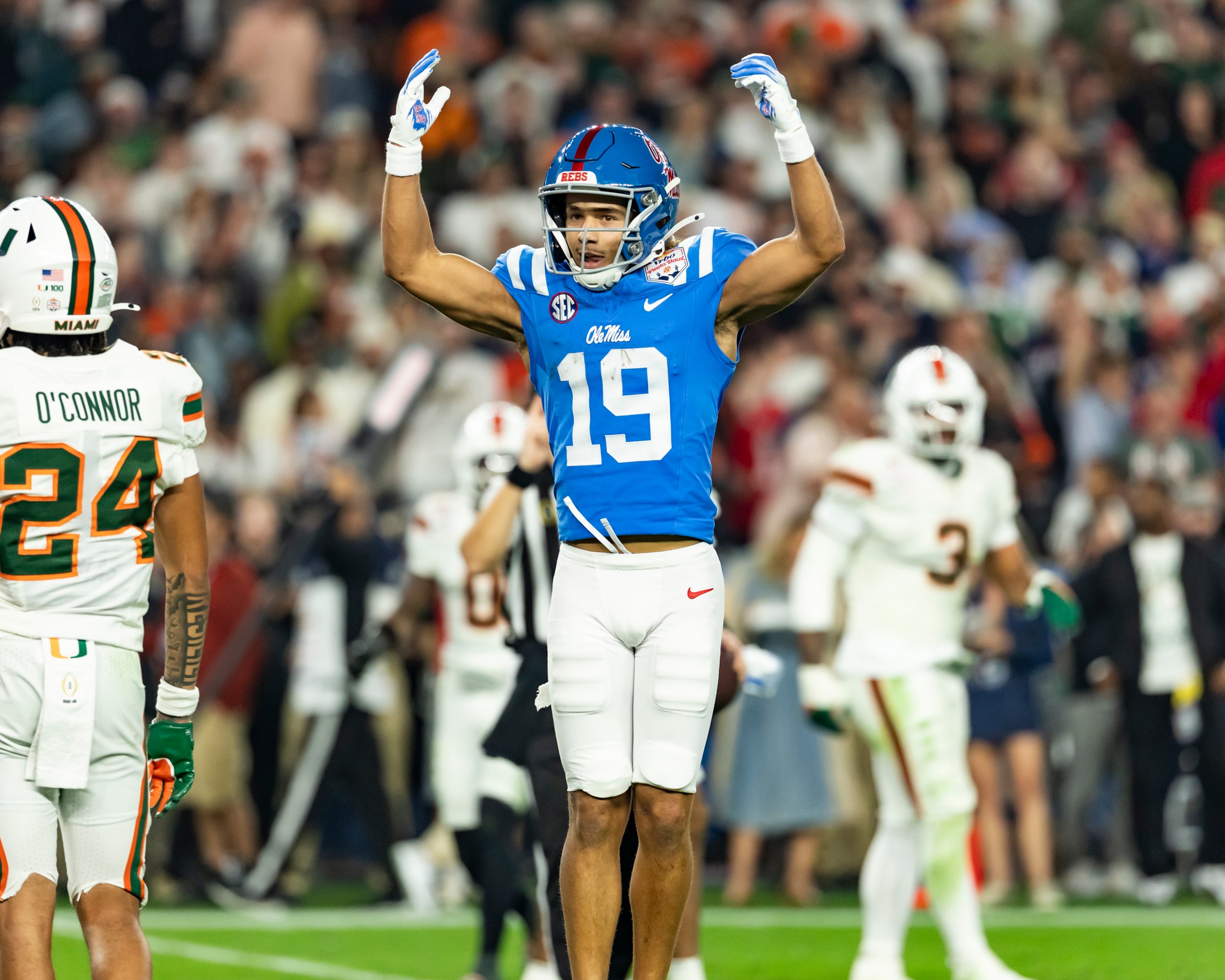 GLENDALE, ARIZONA - JANUARY 8: Cayden Lee #19 of the Mississippi Rebels celebrates a score in the fourth quarter of the 2025 College Football Playoff Semifinal at State Farm Stadium on January 8, 2026 in Glendale, Arizona. (Photo by Steve Limentani/ISI Photos/ISI Photos via Getty Images)