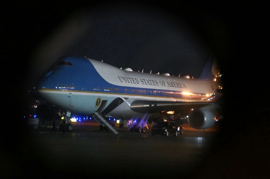 Air Force One, with US President Donald Trump aboard is pictured from inside an Osprey aircraft, as he departs from Palm Beach International Airport, in West Palm Beach, Florida on January 19.