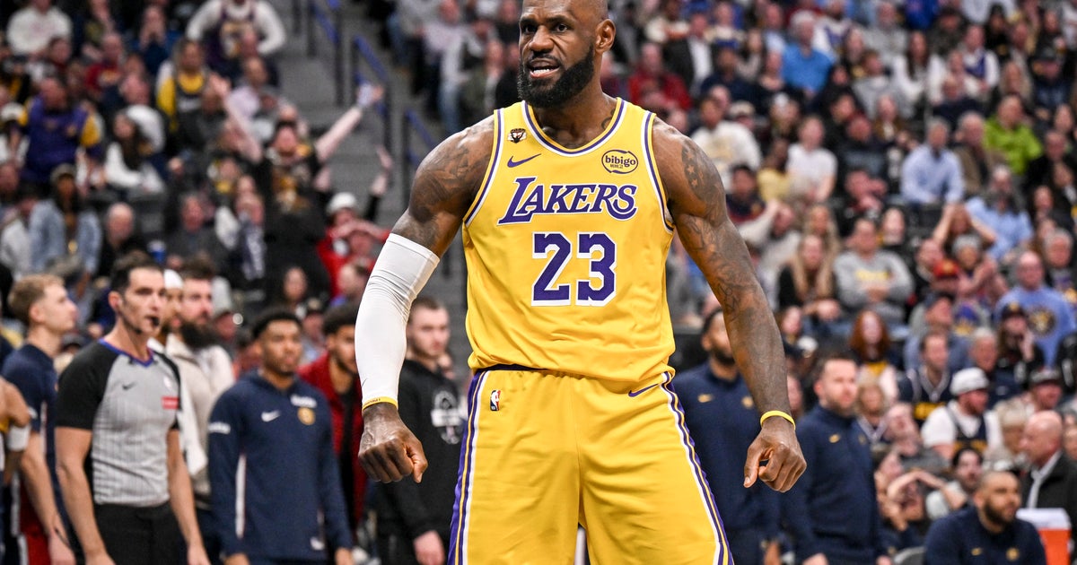 Doncic has a triple-double as the Lakers rally past the short-handed Nuggets, 115-107