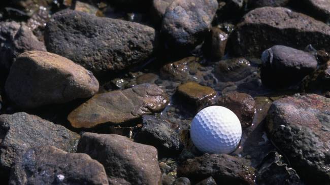 golf ball on rocks