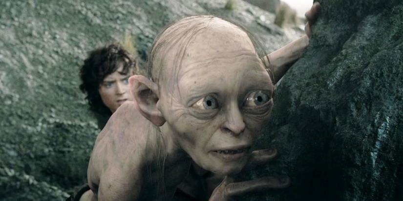 Gollum is hiding behind a rock in Lord of the Rings Two Tower
