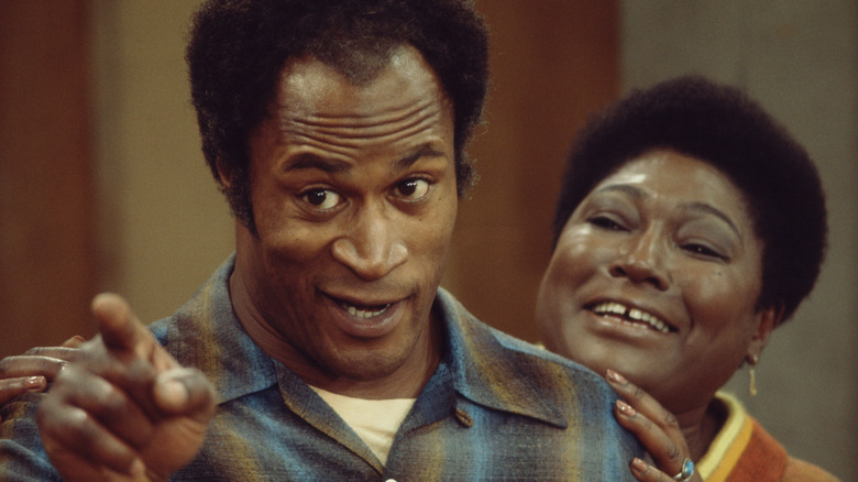 Florida laughing behind James Evans Sr in Good Times