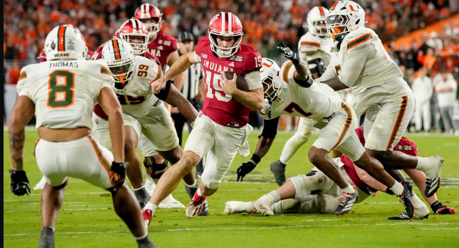 Indiana quarterback Fernando Mendoza (15) rushes into the end zone for a touchdown against Miami during the College Football Playoff national championship game at Hard Rock Stadium in Miami Gardens, Fla., on Jan. 19, 2026. Indiana quarterback Fernando Mendoza (15) rushes into the end zone for a touchdown against Miami during the College Football Playoff national championship game at Hard Rock Stadium in Miami Gardens, Fla., on Jan. 19, 2026.