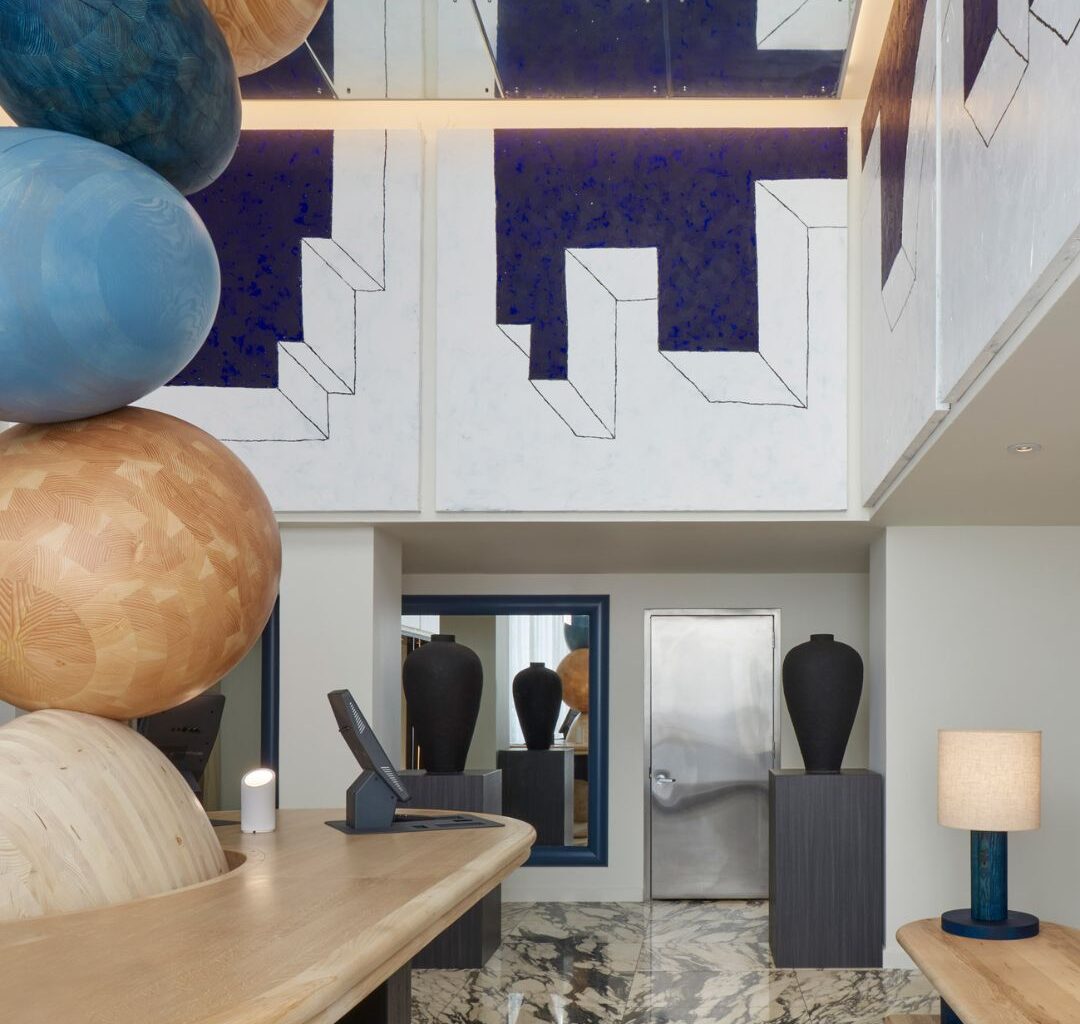 Jan Hendzel designs towering timber sculpture for Hotel Park Ave