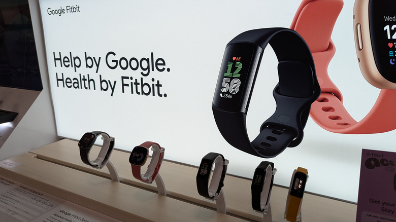 Google Fitbit smartwatches on display at a store