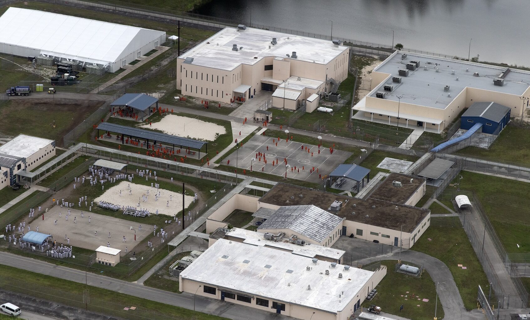 MIAMI, FLORIDA - JULY 4: In an aerial view from a helicopter, detainees are seen at Krome Detention Center run by United States Immigration and Customs Enforcement on July 4, 2025 in Miami, Florida. (Photo by Alon Skuy/Getty Images)