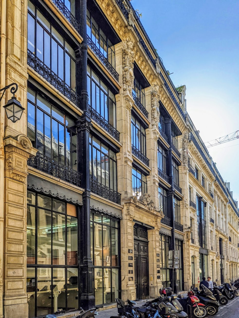Nineteenth-century codes did not generally regulate facade pattern or detail, and architects were free to experiment if they so chose, a liberty they generally enjoyed responsibly. This unusual commercial building in Paris dates from 1865.
