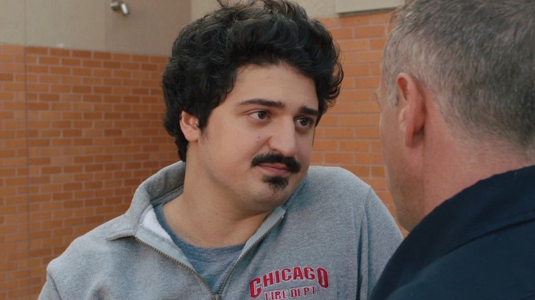 Yuriy Sardarov's Otis Zvonecek wearing a grey Chicago Fire Department shirt on Chicago Fire