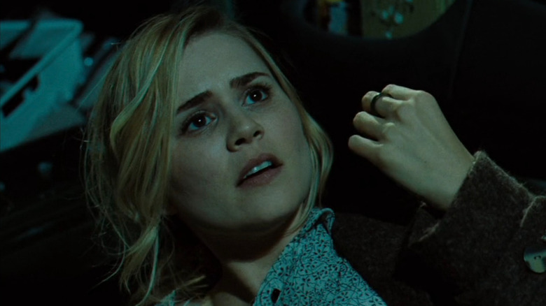 Christine Brown looking up in horror in 