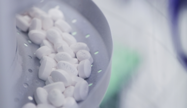 A small pile of wegovy pills pictures in a grey dish during production