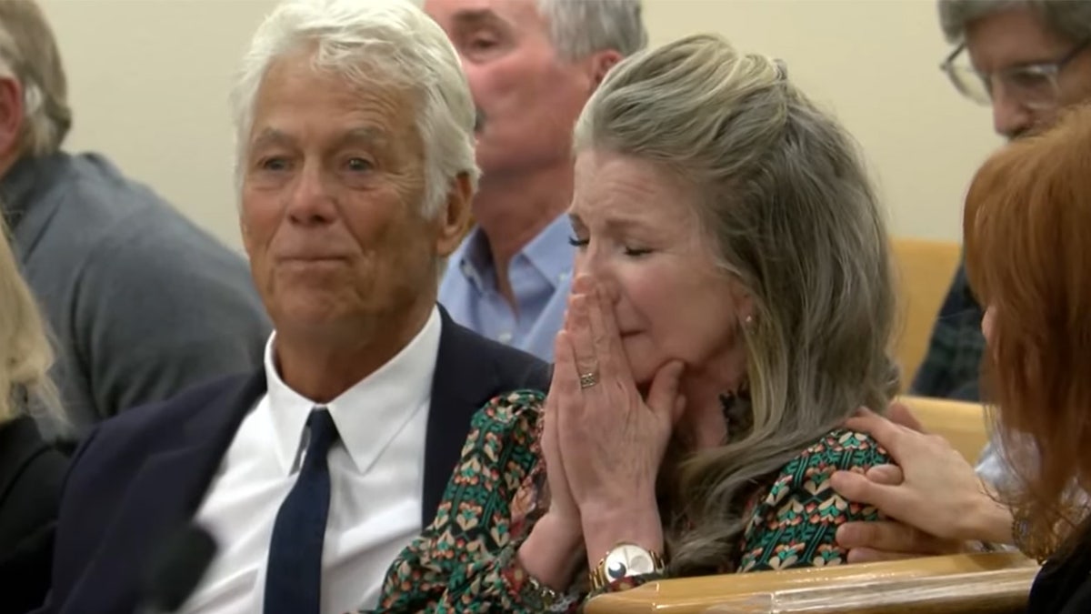 Melissa Gilbert holds hands to her face in Timothy Busfield case hearing.
