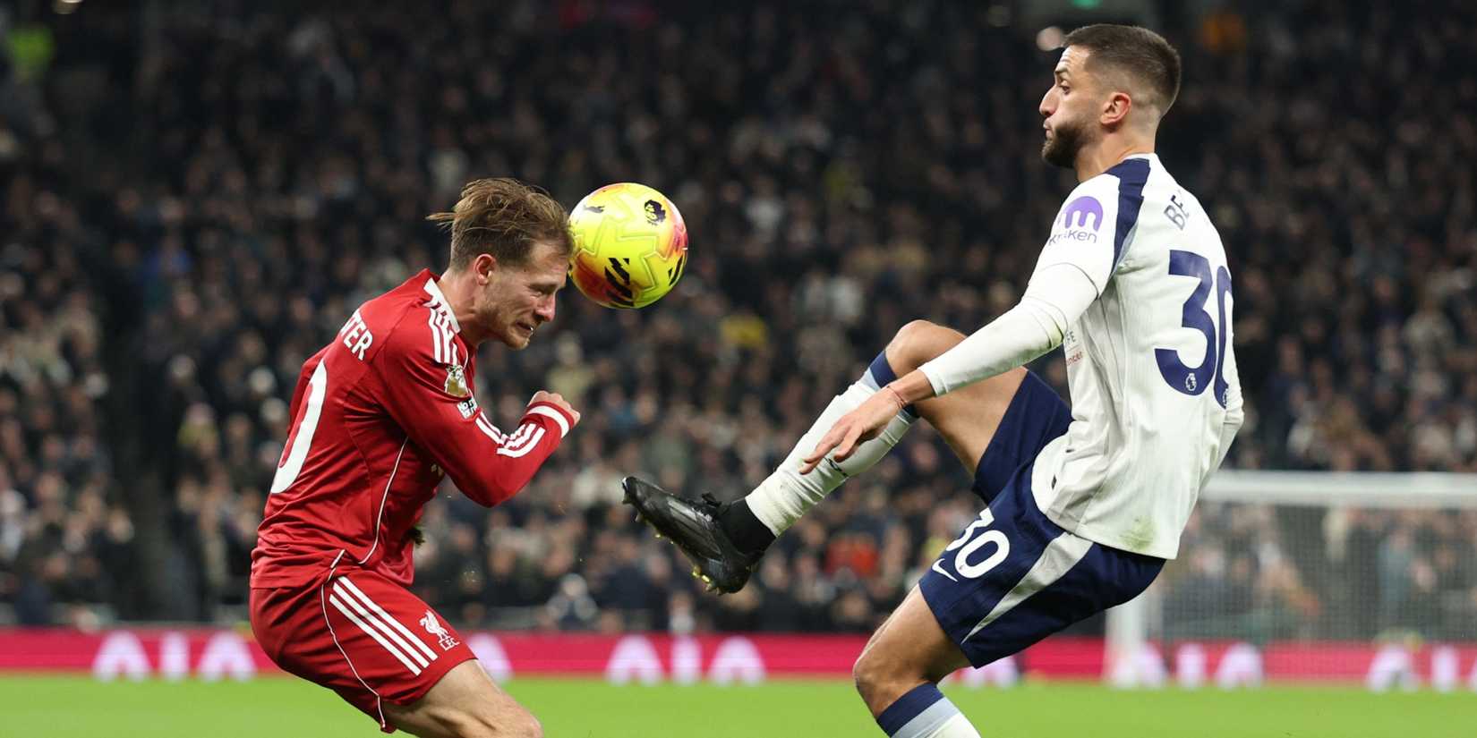 Tottenham Hotspur's Rodrigo Bentancur in action with Liverpool's Alexis Mac Allister