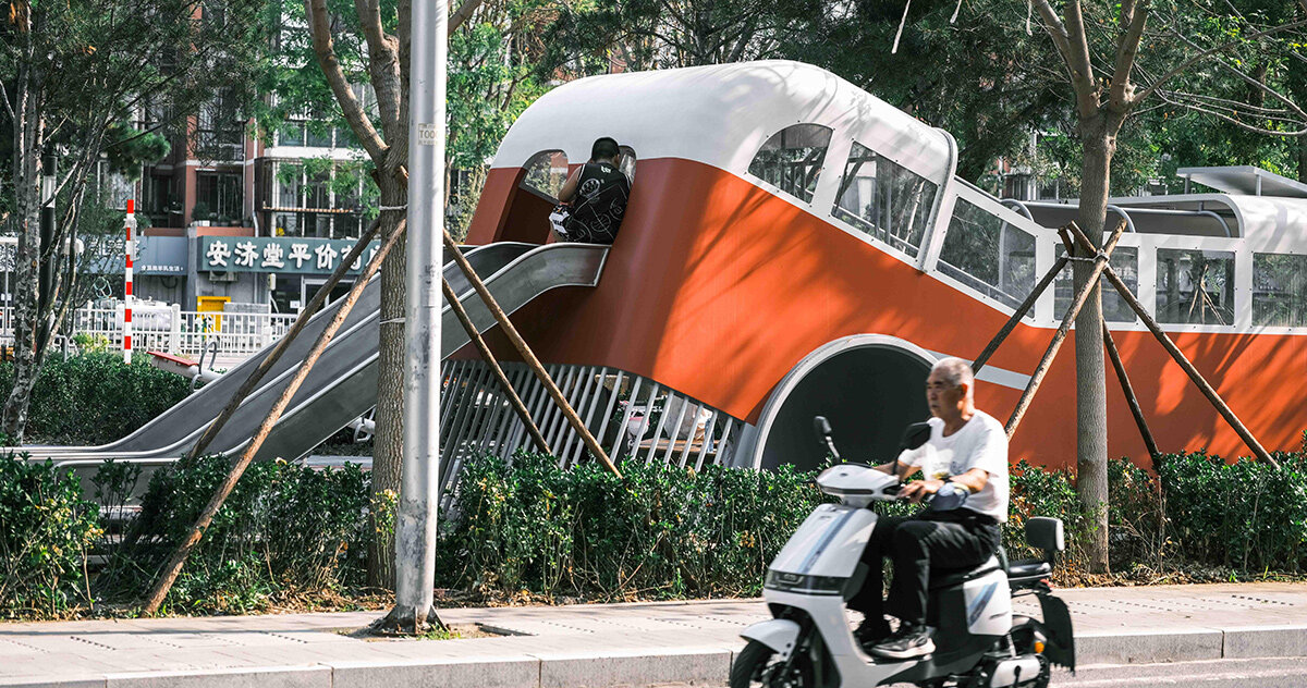 XISUI repurposes old bus for children's playground in beijing