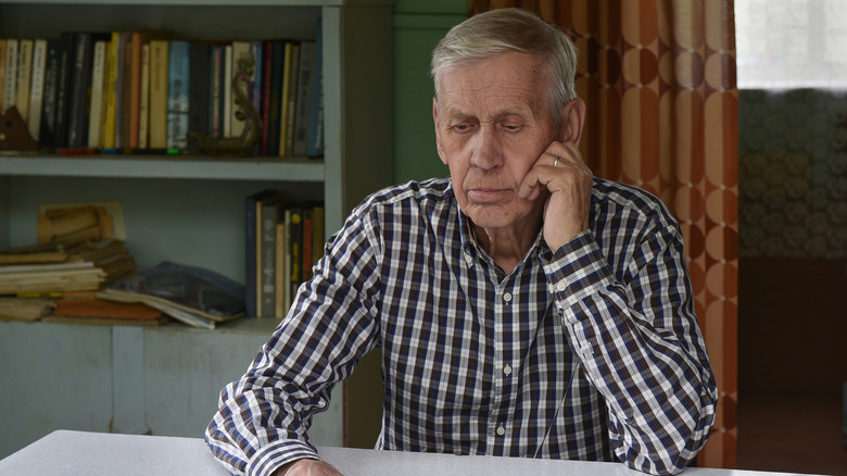 concerned looking older man