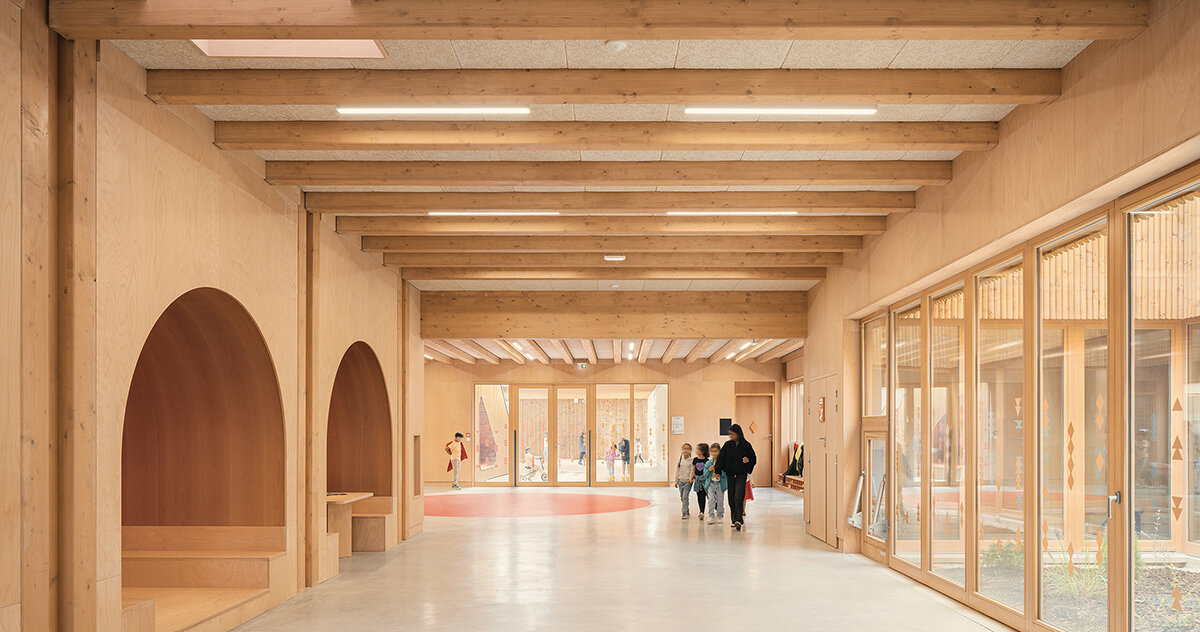 le penhuel & associés designs french school with ubiquitous wooden interiors