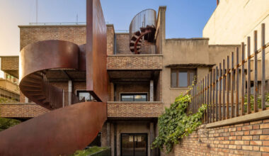 sculptural steel wall breathes new life into iranian poet’s 1970s home