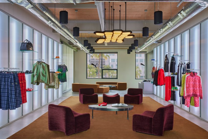 A showroom displaying Pums's new and archive products against translucent glass panels