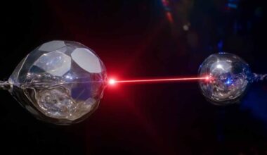 Physicists in Stuttgart examine optical equipment used to teleport quantum information between photons in a laboratory experiment.