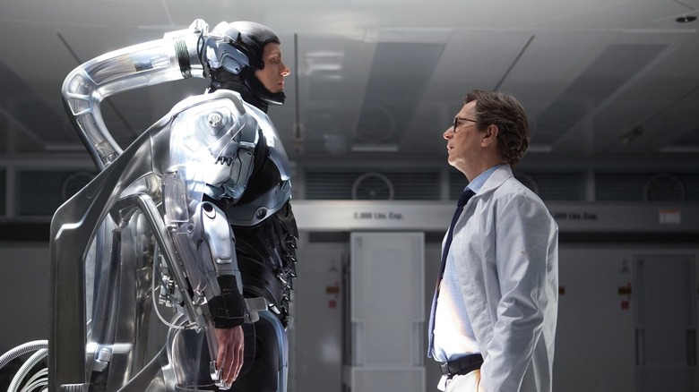 Dr. Dennett Norton addresses RoboCop in 
