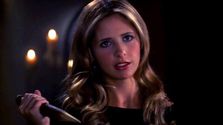 Buffy Summers holding a stake on 