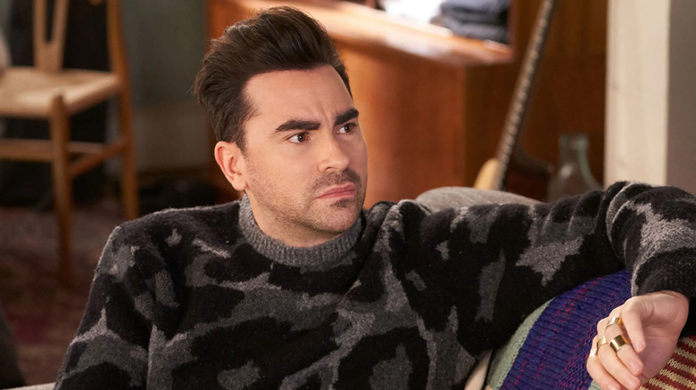 Dan Levy as David Rose look annoyed in Schitt's Creek