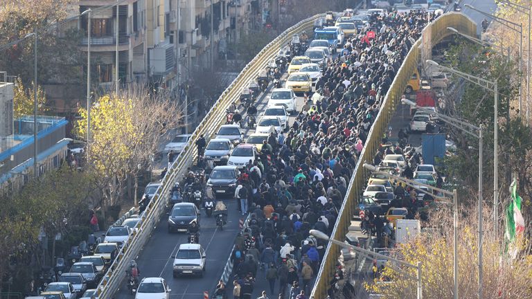 Protesters marching in Tehran on Monday. Pic: Fars News Agency/AP