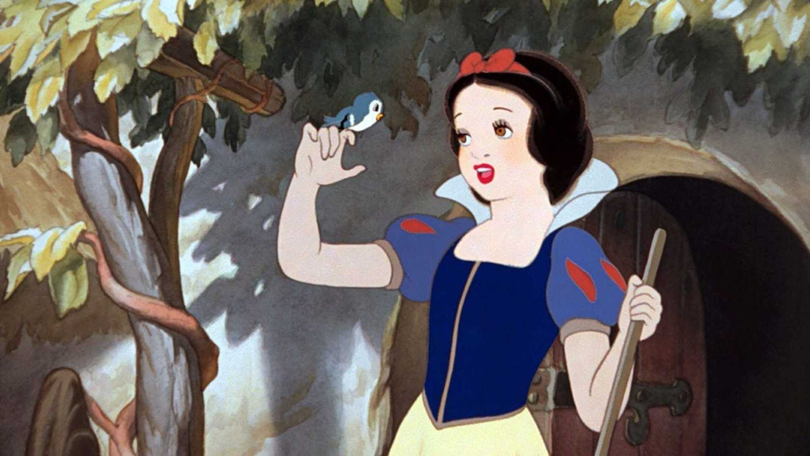 Snow White sings to a bird on her finger in Snow White and the Seven Dwarfs