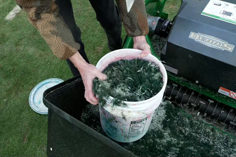 Grass clippings from Lincoln Financial Field are gathered to sell to Eagles fans.