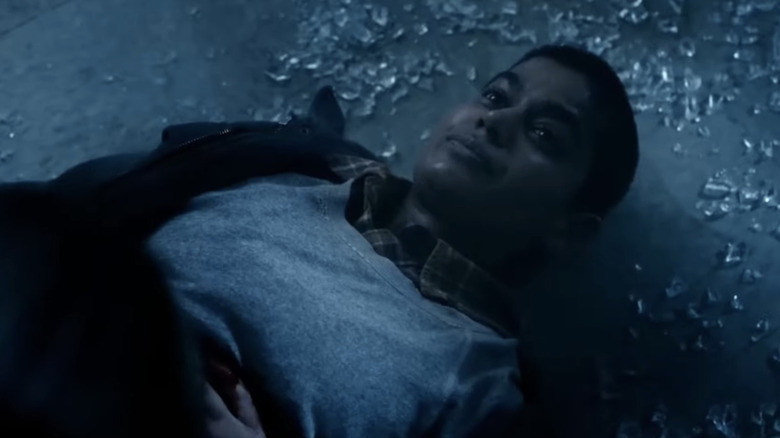 Linnea Berthelsen's Kali Prasad looks up as she lays bleeding out on the floor of the lab in Stranger Things